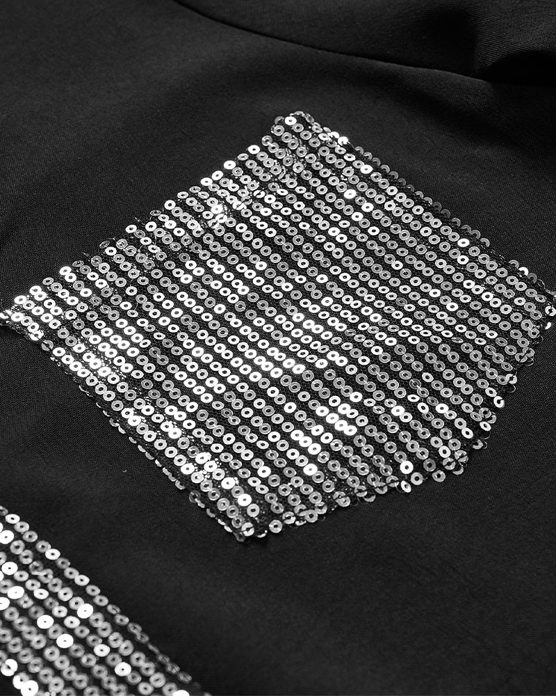 Casual top met knopen en pailletten