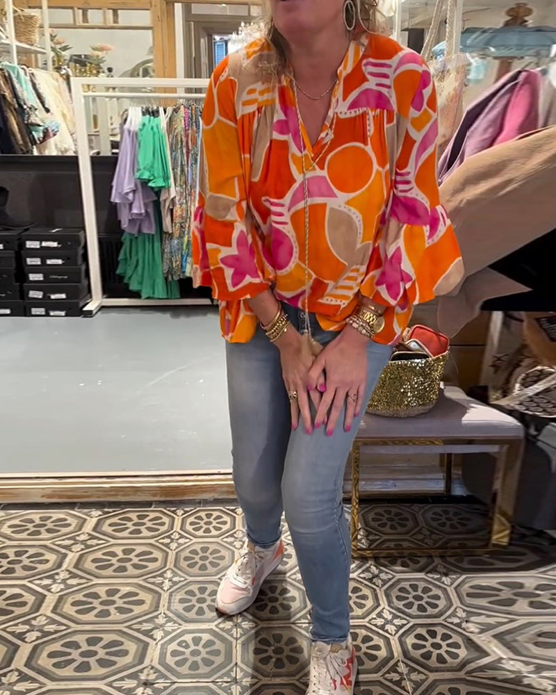 Blouse met kleurrijke en vallende schouders